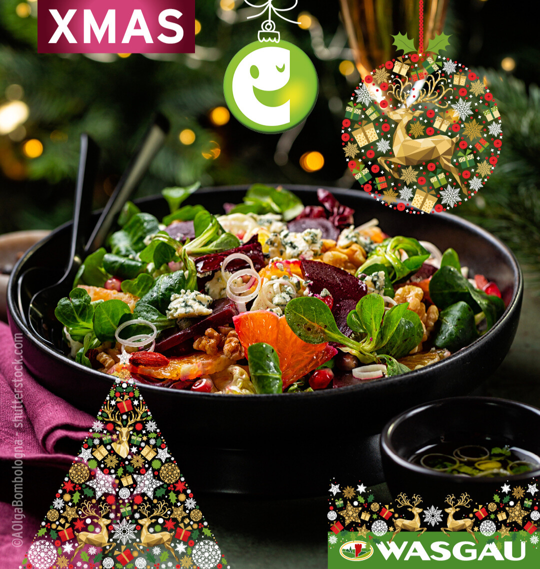 Ein festlicher Salat in einer Schale mit Grünzeug, Nüssen, Käse und Obst - ein köstliches Beispiel für Resteverwertung. Weihnachtsdekoration und das 